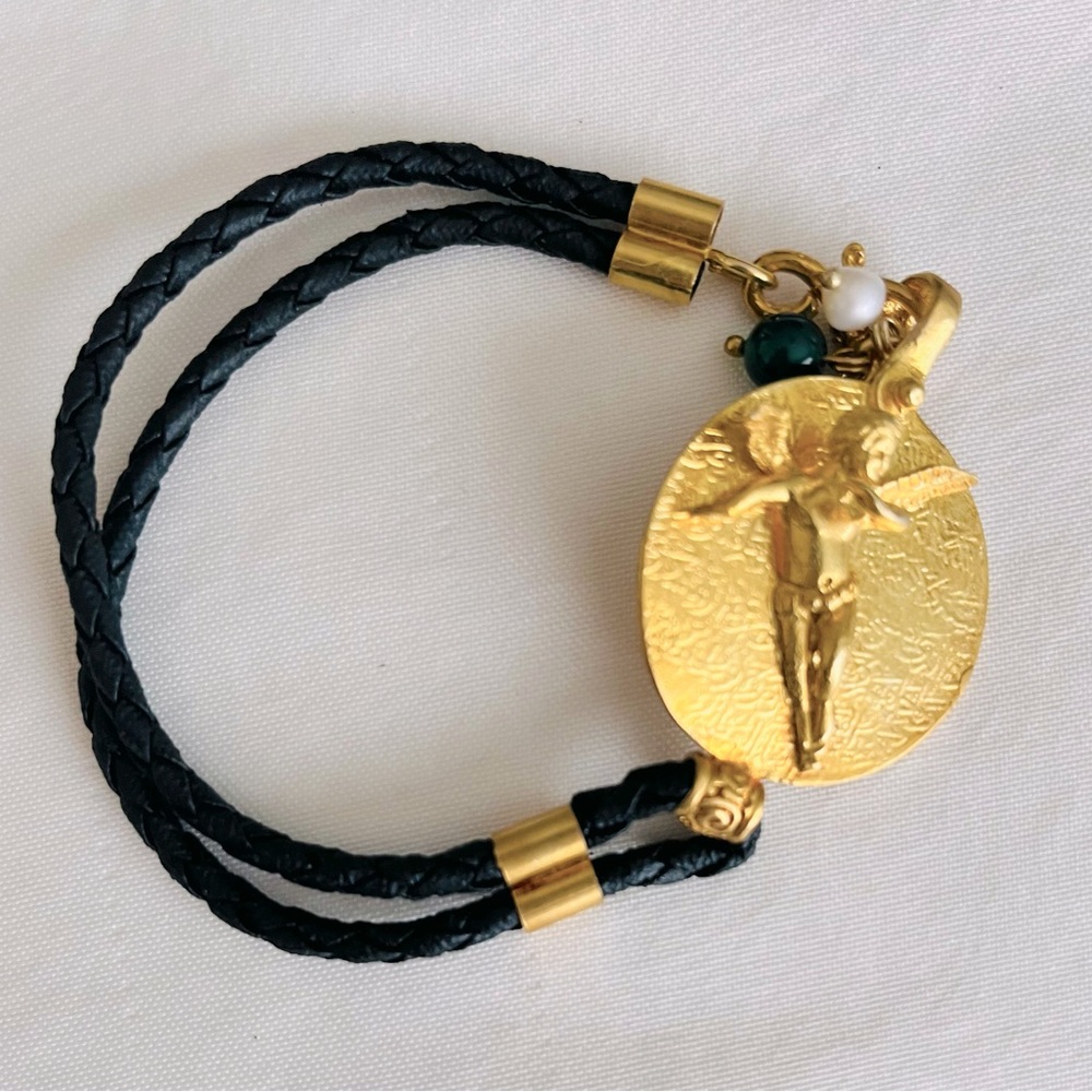 Black rope & gold tone real silver bracelet with beautiful baby cupid figurine